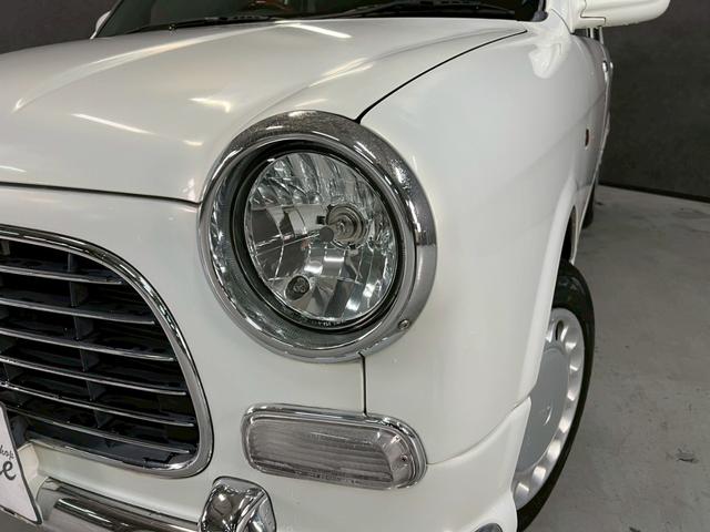 ミラジーノ ジーノ　車検９年１１月　５ＭＴ　マニュアルギヤシフト　キーレス　カセット　ＳＲＳエアバッグ　パワステ　パワーウィンドウ　シートカバー　２ＷＤ（53枚目）