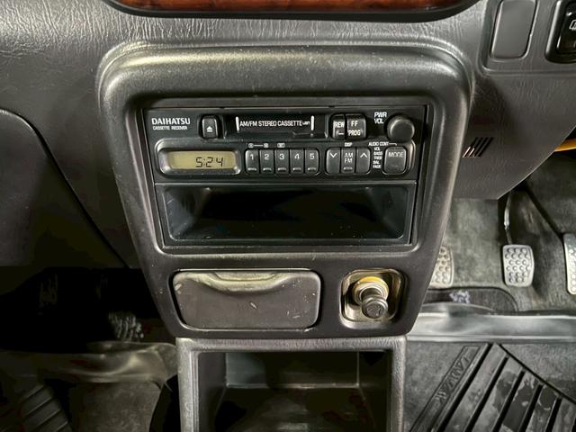 ミラジーノ ジーノ　車検９年１１月　５ＭＴ　マニュアルギヤシフト　キーレス　カセット　ＳＲＳエアバッグ　パワステ　パワーウィンドウ　シートカバー　２ＷＤ（59枚目）