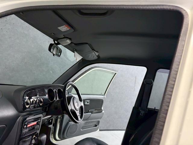 ミラジーノ ミニライトスペシャル　車検９年１２月　４ＷＤ　オートギヤシフト　キーレス　ＣＤ　カセット　ＳＲＳエアバッグ　ヘッドライトレベライザー　パワステ　パワーウィンドウ　スペアータイヤ　シートカバー　フォグランプ　４ＡＴ（10枚目）