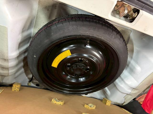 ミラジーノ ミニライトスペシャル　車検９年１２月　４ＷＤ　オートギヤシフト　キーレス　ＣＤ　カセット　ＳＲＳエアバッグ　ヘッドライトレベライザー　パワステ　パワーウィンドウ　スペアータイヤ　シートカバー　フォグランプ　４ＡＴ（34枚目）