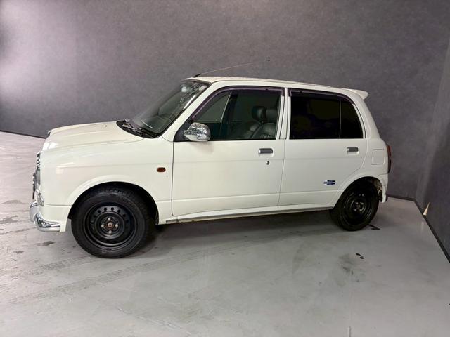 ミラジーノ ミニライトスペシャル　車検９年１２月　４ＷＤ　オートギヤシフト　キーレス　ＣＤ　カセット　ＳＲＳエアバッグ　ヘッドライトレベライザー　パワステ　パワーウィンドウ　スペアータイヤ　シートカバー　フォグランプ　４ＡＴ（42枚目）