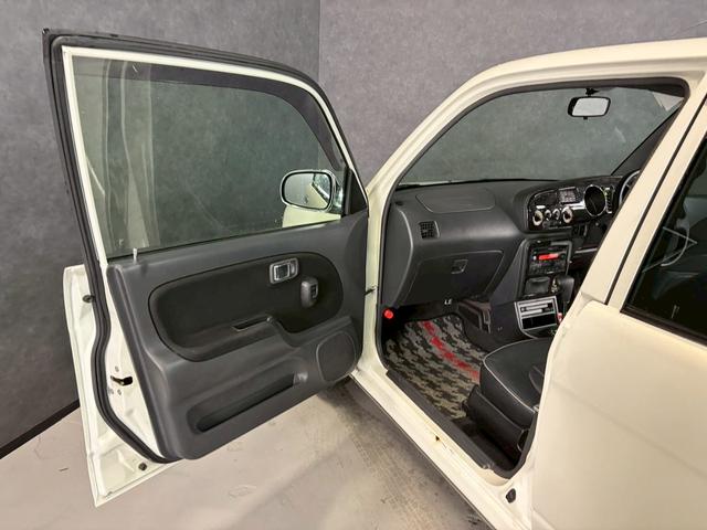 ミラジーノ ミニライトスペシャル　車検９年１２月　４ＷＤ　オートギヤシフト　キーレス　ＣＤ　カセット　ＳＲＳエアバッグ　ヘッドライトレベライザー　パワステ　パワーウィンドウ　スペアータイヤ　シートカバー　フォグランプ　４ＡＴ（47枚目）