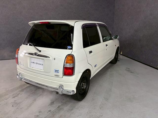 ミラジーノ ミニライトスペシャル　車検９年１２月　４ＷＤ　オートギヤシフト　キーレス　ＣＤ　カセット　ＳＲＳエアバッグ　ヘッドライトレベライザー　パワステ　パワーウィンドウ　スペアータイヤ　シートカバー　フォグランプ　４ＡＴ（48枚目）