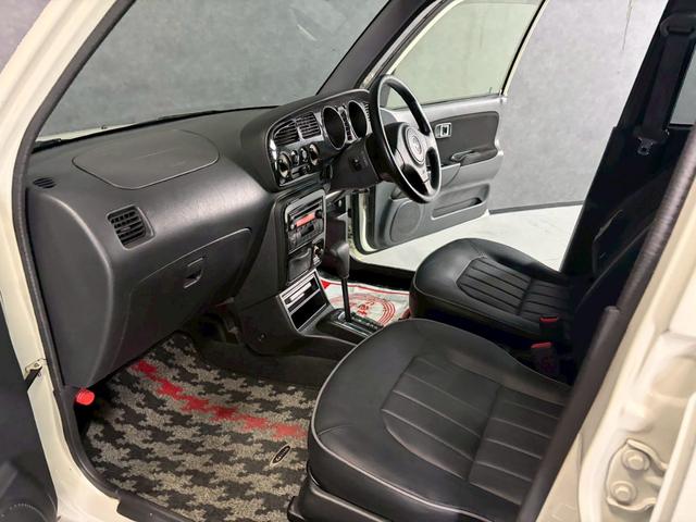 ミラジーノ ミニライトスペシャル　車検９年１２月　４ＷＤ　オートギヤシフト　キーレス　ＣＤ　カセット　ＳＲＳエアバッグ　ヘッドライトレベライザー　パワステ　パワーウィンドウ　スペアータイヤ　シートカバー　フォグランプ　４ＡＴ（50枚目）