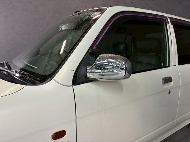 ミラジーノ ミニライトスペシャル　車検９年１２月　４ＷＤ　オートギヤシフト　キーレス　ＣＤ　カセット　ＳＲＳエアバッグ　ヘッドライトレベライザー　パワステ　パワーウィンドウ　スペアータイヤ　シートカバー　フォグランプ　４ＡＴ（52枚目）