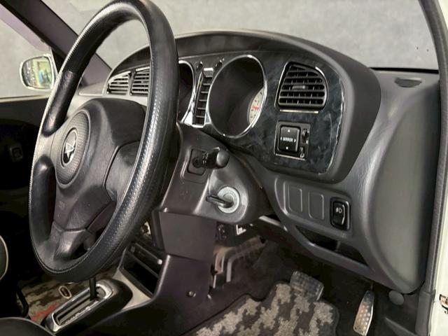 ミラジーノ ミニライトスペシャル　車検９年１２月　４ＷＤ　オートギヤシフト　キーレス　ＣＤ　カセット　ＳＲＳエアバッグ　ヘッドライトレベライザー　パワステ　パワーウィンドウ　スペアータイヤ　シートカバー　フォグランプ　４ＡＴ（53枚目）