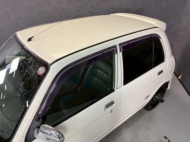 ミラジーノ ミニライトスペシャル　車検９年１２月　４ＷＤ　オートギヤシフト　キーレス　ＣＤ　カセット　ＳＲＳエアバッグ　ヘッドライトレベライザー　パワステ　パワーウィンドウ　スペアータイヤ　シートカバー　フォグランプ　４ＡＴ（54枚目）