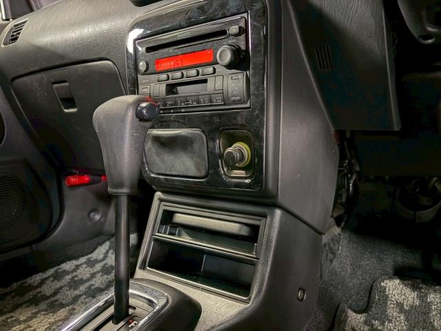 ミラジーノ ミニライトスペシャル　車検９年１２月　４ＷＤ　オートギヤシフト　キーレス　ＣＤ　カセット　ＳＲＳエアバッグ　ヘッドライトレベライザー　パワステ　パワーウィンドウ　スペアータイヤ　シートカバー　フォグランプ　４ＡＴ（64枚目）