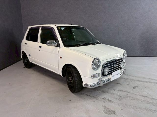 ミラジーノ ミニライトスペシャル　車検９年１２月　４ＷＤ　オートギヤシフト　キーレス　ＣＤ　カセット　ＳＲＳエアバッグ　ヘッドライトレベライザー　パワステ　パワーウィンドウ　スペアータイヤ　シートカバー　フォグランプ　４ＡＴ（67枚目）