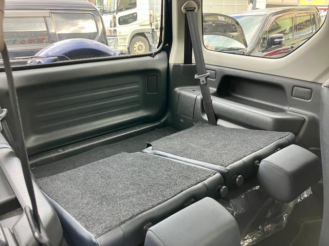ジムニー ランドベンチャー　特別仕様車　５速ＭＴ　インタークーラーターボ　パートタイム４ＷＤ　高低二段切替式（後輪駆動ベース）　ヒーター付き黒本革シート　ポータブルワンセグナビ　アルミホイール　キーレス（28枚目）