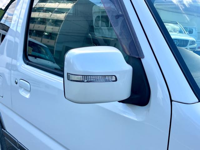 ジムニー ランドベンチャー　４ＷＤ　５速ＭＴ　ツートンカラー　禁煙車　シートヒーター　ポータブルナビ　ＥＴＣ　キーレス　ルーフレール　アルミホイール（12枚目）