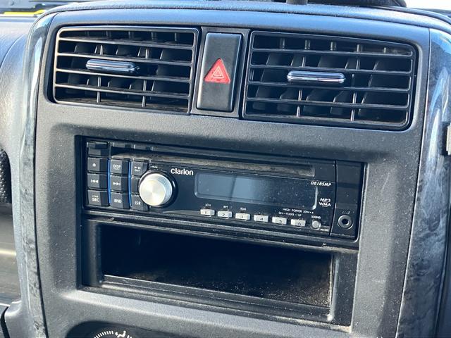 ジムニー ランドベンチャー　４ＷＤ　５速ＭＴ　ツートンカラー　禁煙車　シートヒーター　ポータブルナビ　ＥＴＣ　キーレス　ルーフレール　アルミホイール（32枚目）