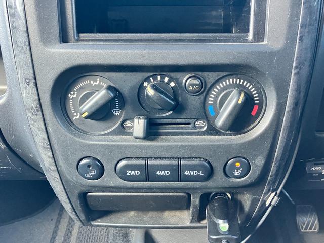 ジムニー ランドベンチャー　４ＷＤ　５速ＭＴ　ツートンカラー　禁煙車　シートヒーター　ポータブルナビ　ＥＴＣ　キーレス　ルーフレール　アルミホイール（33枚目）