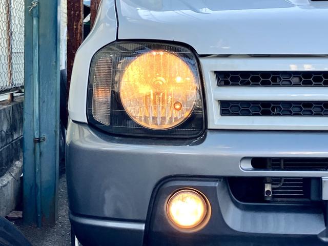 ジムニー ランドベンチャー　４ＷＤ　５速ＭＴ　ツートンカラー　禁煙車　シートヒーター　ポータブルナビ　ＥＴＣ　キーレス　ルーフレール　アルミホイール（44枚目）