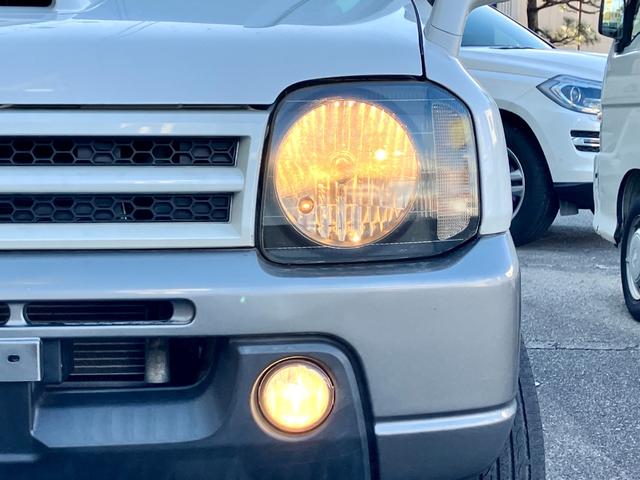 ジムニー ランドベンチャー　４ＷＤ　５速ＭＴ　ツートンカラー　禁煙車　シートヒーター　ポータブルナビ　ＥＴＣ　キーレス　ルーフレール　アルミホイール（45枚目）