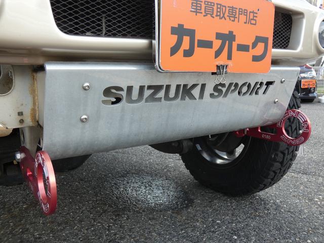 ジムニー ワイルドウインド　リフトアップ　ワークホイール　オープンカントリーＲ／Ｔ　モンスターマフラー　社外テールライト　社外ハンドル（エアバックレス）　社外シフトノブ　ＥＴＣ　ドラレコ　Ｒカメラ　社外ナビ　Ｂｌｕｅｔｏｏｔｈ（3枚目）