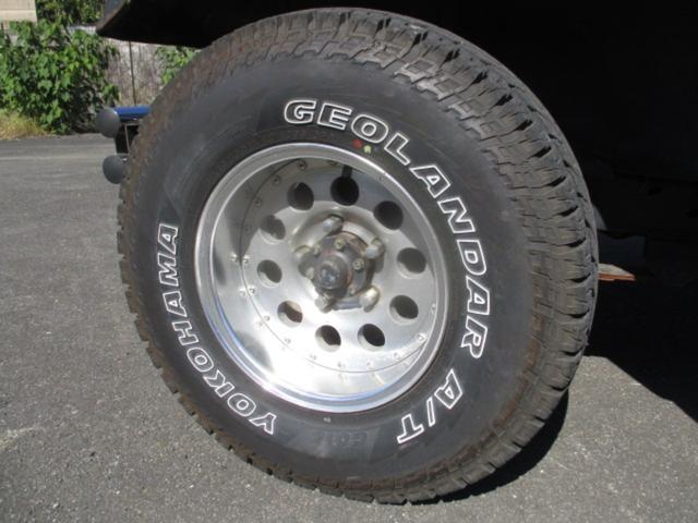 ジープ キャンバストップ　ディーゼルターボ　４ＷＤ　サントップ（新品）　タイヤ（ＧＥＯＬＡＮＤＡＲ　Ａ／Ｔ）　４ＭＴ　ターボ　アルミホイール　ＬＥＤヘッドランプ（39枚目）