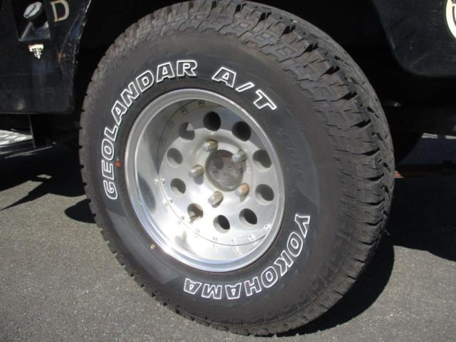 ジープ キャンバストップ　ディーゼルターボ　４ＷＤ　サントップ（新品）　タイヤ（ＧＥＯＬＡＮＤＡＲ　Ａ／Ｔ）　４ＭＴ　ターボ　アルミホイール　ＬＥＤヘッドランプ（40枚目）