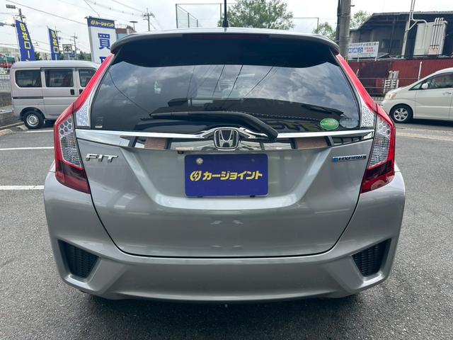 フィットハイブリッド Ｌパッケージ　ワンオーナー　屋内保管　純正ナビ　バックカメラ　ＥＴＣ　禁煙車　ＬＥＤヘッドライト　クルーズコントロール　あんしんＰＫＧ　コンフォートビューＰＫＧ（55枚目）