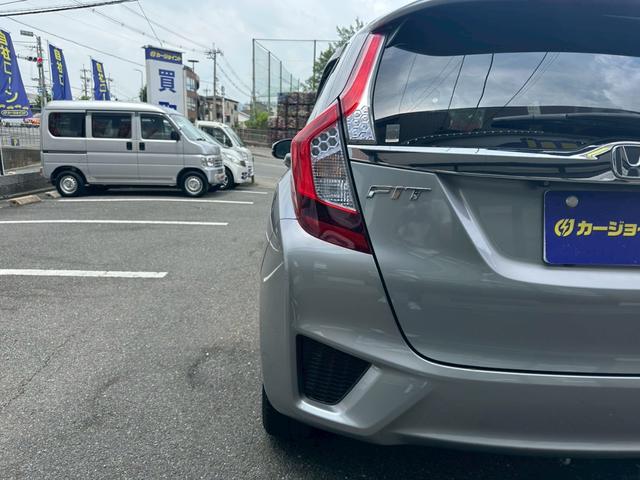 フィットハイブリッド Ｌパッケージ　ワンオーナー　屋内保管　純正ナビ　バックカメラ　ＥＴＣ　禁煙車　ＬＥＤヘッドライト　クルーズコントロール　あんしんＰＫＧ　コンフォートビューＰＫＧ（56枚目）