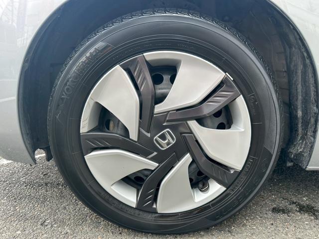フィットハイブリッド Ｌパッケージ　ワンオーナー　屋内保管　純正ナビ　バックカメラ　ＥＴＣ　禁煙車　ＬＥＤヘッドライト　クルーズコントロール　あんしんＰＫＧ　コンフォートビューＰＫＧ（60枚目）