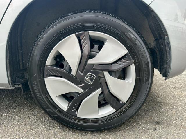 フィットハイブリッド Ｌパッケージ　ワンオーナー　屋内保管　純正ナビ　バックカメラ　ＥＴＣ　禁煙車　ＬＥＤヘッドライト　クルーズコントロール　あんしんＰＫＧ　コンフォートビューＰＫＧ（61枚目）