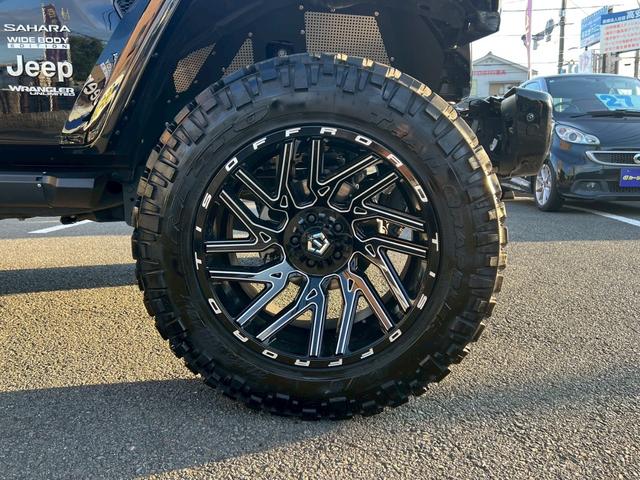 ジープ・ラングラーアンリミテッド サハラ　ＦＯＸサス　ＴＩＳアルミ　サイドオートステップ　　ワンオーナー　禁煙車　４ＷＤ　クルコン　ＢＳＭ　　　　シートヒーター　ドラレコ　ＥＴＣ（54枚目）