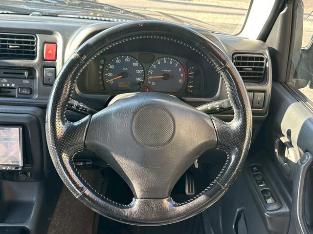 ジムニー ＸＧ　３インチアップ　異色全塗装　社外ナビ　ＥＴＣ（10枚目）