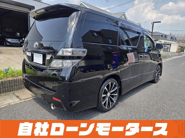 ヴェルファイア ２．４Ｚ　プラチナセレクションＩＩ　純正フリップダウンモニター　ツインムーンルーフ　パワーバックドア　両側パワースライドドア　社外１９ＡＷ　ナビフルセグＤＶＤ　Ｂカメラ　Ｃｌａｚｚｉｏシートカバー　スマートキー　ミラーガーニッシュ（64枚目）