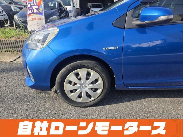 アクア Ｇ　純正ナビテレビＣＤ　ＡＵＸ　Ｂｌｕｅｔｏｏｔｈオーディオ　Ｂカメラ　オートＨＩＤヘッドライト　スマートキー　プッシュスタート　革巻きステアリング　オートエアコン　スタドレスタイヤ社外アルミセット（46枚目）