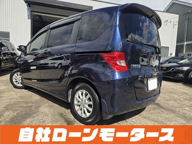 フリード フレックス Fパッケージ 純正HDDナビテレビ CD ミュージックサーバー DVD バックカメラ ステアリングオーディオスイッチ 社外14インチアルミホイール キーレスエントリーキー 電格ウインカーミラー ドアバイザー(9枚目)