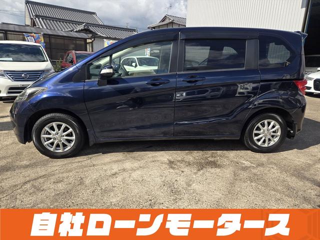 フリード フレックス Fパッケージ 純正HDDナビテレビ CD ミュージックサーバー DVD バックカメラ ステアリングオーディオスイッチ 社外14インチアルミホイール キーレスエントリーキー 電格ウインカーミラー ドアバイザー(13枚目)