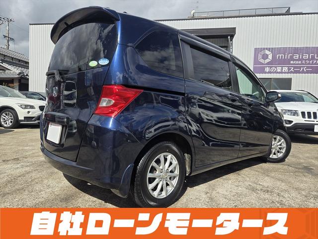 フリード フレックス Fパッケージ 純正HDDナビテレビ CD ミュージックサーバー DVD バックカメラ ステアリングオーディオスイッチ 社外14インチアルミホイール キーレスエントリーキー 電格ウインカーミラー ドアバイザー(41枚目)