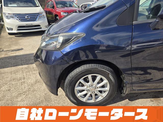 フリード フレックス Fパッケージ 純正HDDナビテレビ CD ミュージックサーバー DVD バックカメラ ステアリングオーディオスイッチ 社外14インチアルミホイール キーレスエントリーキー 電格ウインカーミラー ドアバイザー(43枚目)