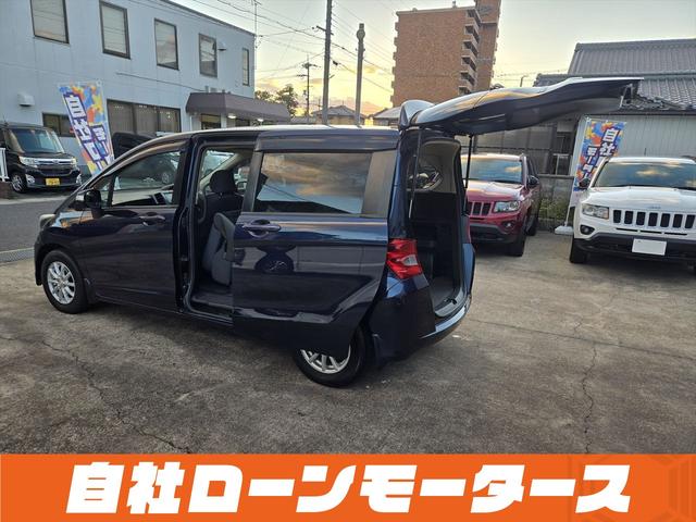 フリード フレックス Fパッケージ 純正HDDナビテレビ CD ミュージックサーバー DVD バックカメラ ステアリングオーディオスイッチ 社外14インチアルミホイール キーレスエントリーキー 電格ウインカーミラー ドアバイザー(53枚目)