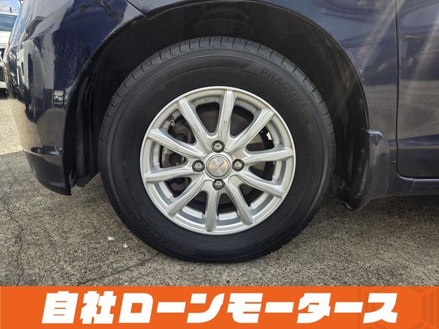 フリード フレックス Fパッケージ 純正HDDナビテレビ CD ミュージックサーバー DVD バックカメラ ステアリングオーディオスイッチ 社外14インチアルミホイール キーレスエントリーキー 電格ウインカーミラー ドアバイザー(63枚目)