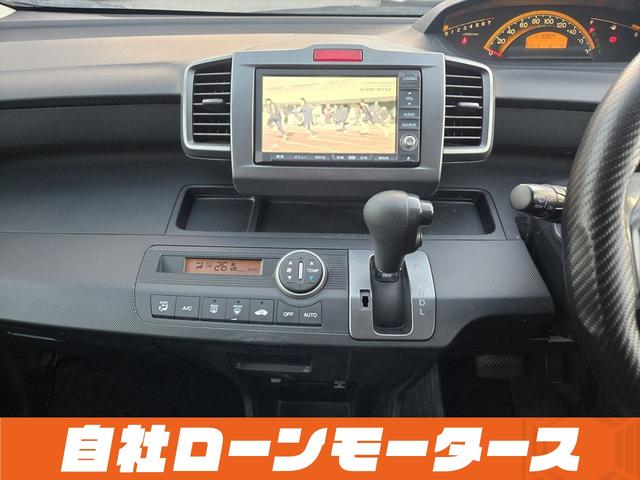 フリード フレックス Fパッケージ 純正HDDナビテレビ CD ミュージックサーバー DVD バックカメラ ステアリングオーディオスイッチ 社外14インチアルミホイール キーレスエントリーキー 電格ウインカーミラー ドアバイザー(69枚目)