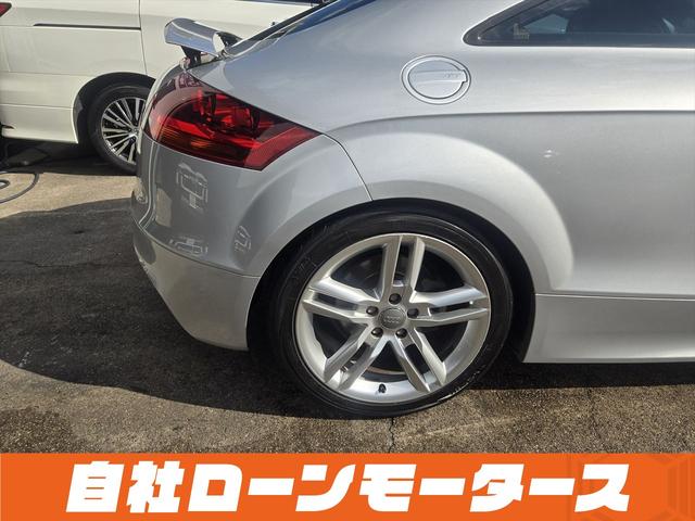 TTクーペ 1.8TFSI Sラインパッケージ Sラインロゴ入り半革シート+ステアリング 電動リアウィング ナビフルセグCDDVD Bluetooth Bカメラ ミラーヒーターパドルシフト スペアキーオートHIDライト フォグリアフォグ純正17AW(33枚目)