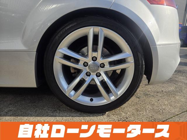 TTクーペ 1.8TFSI Sラインパッケージ Sラインロゴ入り半革シート+ステアリング 電動リアウィング ナビフルセグCDDVD Bluetooth Bカメラ ミラーヒーターパドルシフト スペアキーオートHIDライト フォグリアフォグ純正17AW(70枚目)