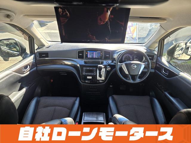 エルグランド ２５０ハイウェイスターアーバンクロム　ＡＬＰＩＮＥフリップダウンモニター　両側パワースライドドア　純正ナビフルセグＤＶＤ　Ｂｌｕｅｔｏｏｔｈ　Ｂカメラ　ハーフレザー　オットマン　ステアスイッチ　オートＨＩＤヘッドライト　フォグ純正１８ＡＷ（10枚目）