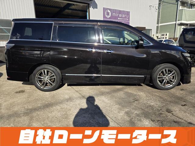 エルグランド ２５０ハイウェイスターアーバンクロム　ＡＬＰＩＮＥフリップダウンモニター　両側パワースライドドア　純正ナビフルセグＤＶＤ　Ｂｌｕｅｔｏｏｔｈ　Ｂカメラ　ハーフレザー　オットマン　ステアスイッチ　オートＨＩＤヘッドライト　フォグ純正１８ＡＷ（12枚目）