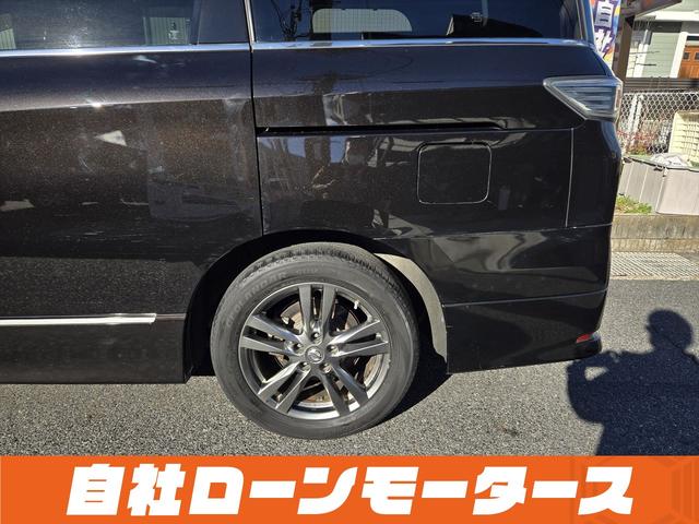 エルグランド ２５０ハイウェイスターアーバンクロム　ＡＬＰＩＮＥフリップダウンモニター　両側パワースライドドア　純正ナビフルセグＤＶＤ　Ｂｌｕｅｔｏｏｔｈ　Ｂカメラ　ハーフレザー　オットマン　ステアスイッチ　オートＨＩＤヘッドライト　フォグ純正１８ＡＷ（51枚目）