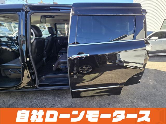 エルグランド ２５０ハイウェイスターアーバンクロム　ＡＬＰＩＮＥフリップダウンモニター　両側パワースライドドア　純正ナビフルセグＤＶＤ　Ｂｌｕｅｔｏｏｔｈ　Ｂカメラ　ハーフレザー　オットマン　ステアスイッチ　オートＨＩＤヘッドライト　フォグ純正１８ＡＷ（54枚目）