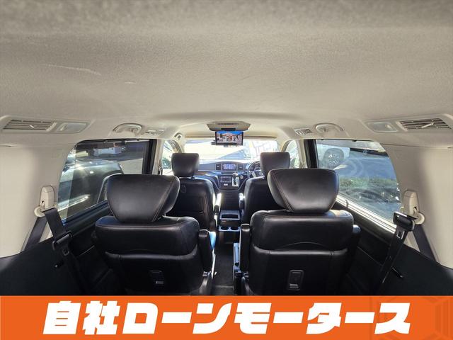 エルグランド ２５０ハイウェイスターアーバンクロム　ＡＬＰＩＮＥフリップダウンモニター　両側パワースライドドア　純正ナビフルセグＤＶＤ　Ｂｌｕｅｔｏｏｔｈ　Ｂカメラ　ハーフレザー　オットマン　ステアスイッチ　オートＨＩＤヘッドライト　フォグ純正１８ＡＷ（63枚目）