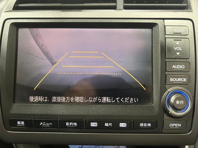 ストリーム ＲＳＺ特別仕様車　ＨＤＤナビエディション　純正ＨＤＤインターナビ／バックカメラ／ＥＴＣ／ＤＶＤ再生／音楽録音／ＨＩＤヘッドライト／オートライト／フォグ／純正１７インチアルミ／パドルシフト／オートエアコン／７人乗り／キーレス／車検整備付き（10枚目）