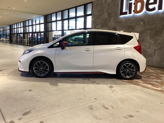 ノート ニスモ ETC バックカメラ アルミホイール スマートキー アイドリングストップ 電動格納ミラー CVT 盗難防止システム 衝突安全ボディ ABS ESC Bluetooth エアコン パワーステアリング(7枚目)