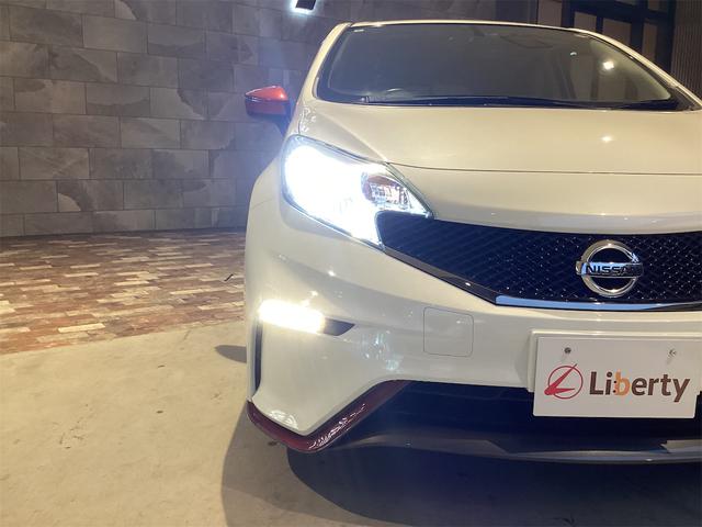 ノート ニスモ ETC バックカメラ アルミホイール スマートキー アイドリングストップ 電動格納ミラー CVT 盗難防止システム 衝突安全ボディ ABS ESC Bluetooth エアコン パワーステアリング(28枚目)