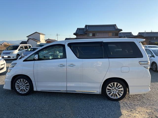 ヴェルファイア 2.4V V モデリスタエアロ 8インチナビ 後席モニター 両側電動スライドドア 1オーナー 禁煙車 白内装 べージュ内装 フルセグ(7枚目)