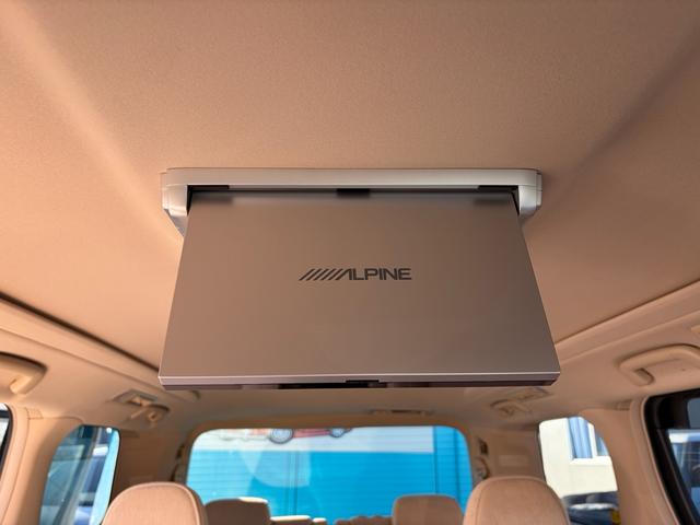 ヴェルファイア 2.4V V モデリスタエアロ 8インチナビ 後席モニター 両側電動スライドドア 1オーナー 禁煙車 白内装 べージュ内装 フルセグ(44枚目)