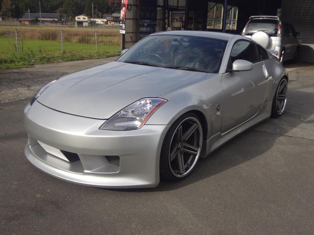 フェアレディＺ バージョンＴ　禁煙車　社外フルエアロ　減衰調整式車高調　大径マフラー　社外２０ＡＷ　フィルム施工　黒革　シートヒーター　革巻ハンドル　パワーシート　社外ＤＡ　ＨＤＭＩ　ＵＳＢ　社外ツイーター　ＥＴＣ　ＴＳＣオフ（7枚目）